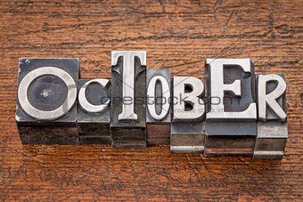 October month in metal type