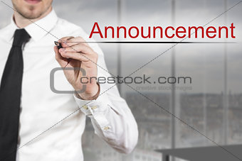 businessman writing announcement in the air