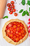 Cherry tomato tart. Cooking process.