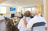 Senior Couple Overlooking A Beautiful Living Room