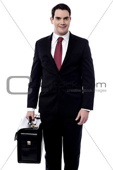 Male entrepreneur carrying a briefcase