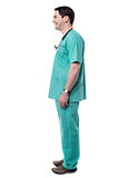 Confident male doctor standing