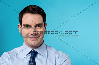 Middle aged businessman posing to camera