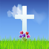 Easter background with Cross and tulips on a blue sky