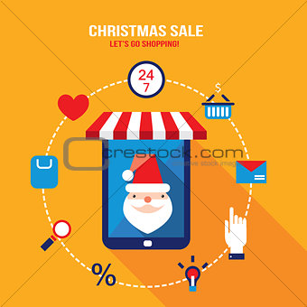 Tablet with Santa Claus on the screen and shopping web icons