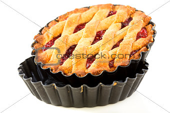 Cake with raspberry jam in the form of a non-stick coating.