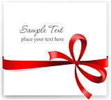 Greeting card with a red ribbon.