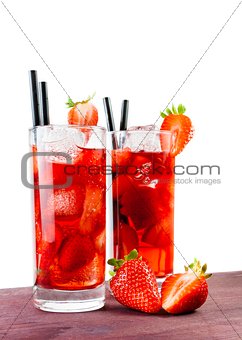 Strawberry cocktail with ice on old wood table 