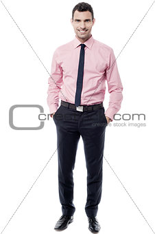 Relaxed middle aged businessman posing