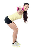 Sporty woman with dumbbells