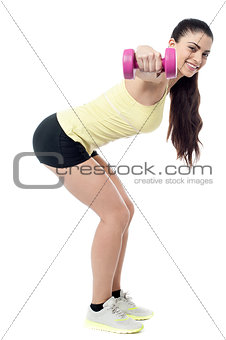 Sporty woman with dumbbells