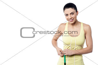 Woman taking body measurements