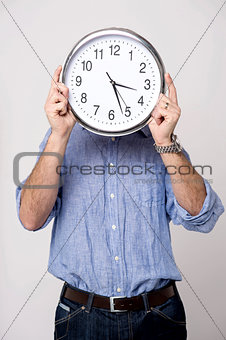 Man holding clock, show time to you.
