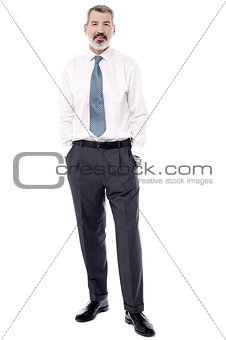 Confident businessman posing relaxed