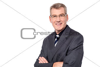 Successful businessman with folded arms