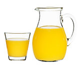 orange juice in a glass and carafe