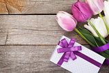 Fresh tulips bouquet and gift box