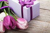 Fresh tulips bouquet and gift box