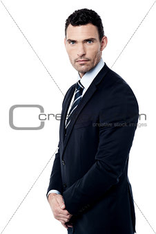 Businessman posing in clasped hands