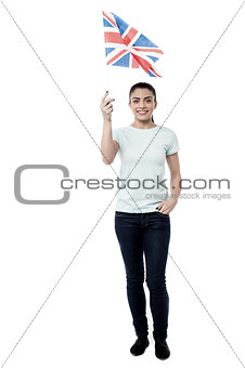 Cheering for nation, woman holding UK flag