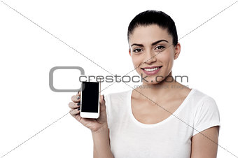 Young woman with blank smartphone screen
