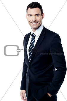 Confident smiling businessman posing