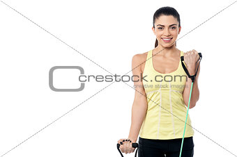 Woman exercising with rubber band