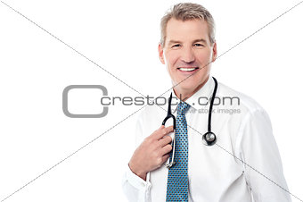 Smiling mature doctor isolated on white