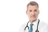 Smiling experienced doctor isolated over white