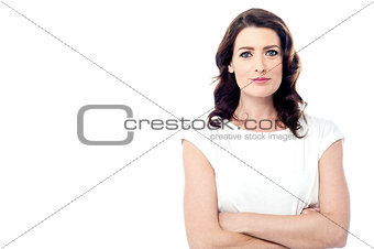 Young women with arms crossed