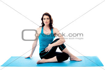 Young woman doing fitness exercises