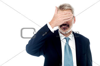 Businessman making the see no gesture