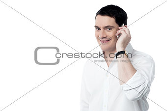 Happy man talking on his mobile phone