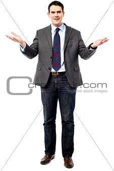Middle aged businessman with open hands