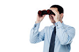 Middle aged  business man with binocular
