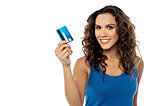 Attractive woman displaying her credit card