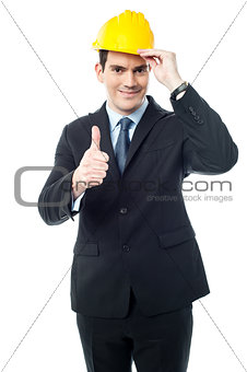 Successful engineer showing thumbs up