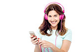 Woman with cell phone and hear phone