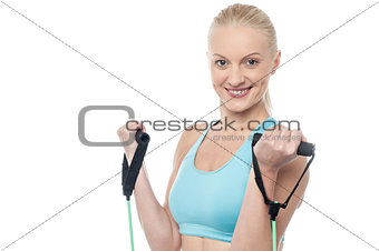Instructor with exercise bands isolated on a white