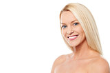 Smiling woman with bare shoulders