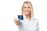 Smart executive woman holding credit card