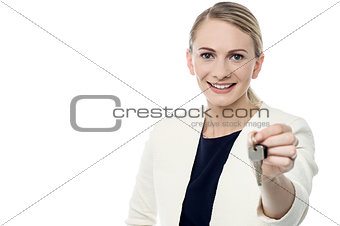Real estate agent offering new house key