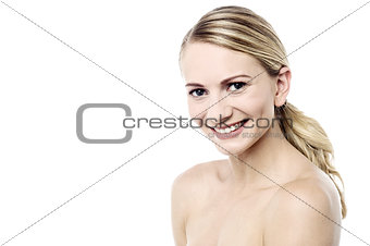 Smiling woman with bare shoulders