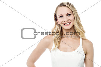 Smiling young girl looking at camera