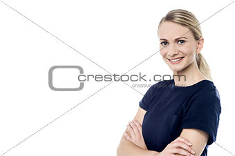 Pretty woman posing with folded arms