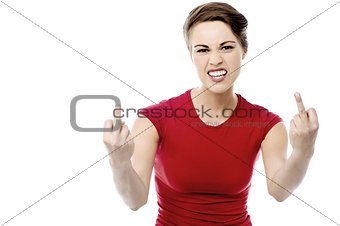 Young woman making obscene hand gesture