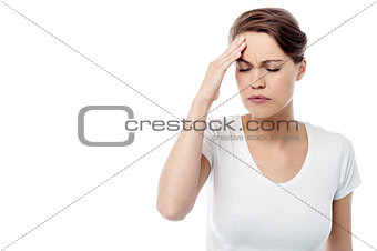 Woman has a migraine