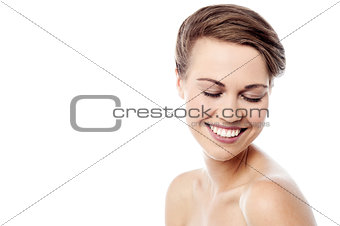 Shy woman with healthy skin