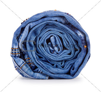 roll light blue jeans on a white background