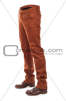 empty voluminous  jeans with boots on a white background